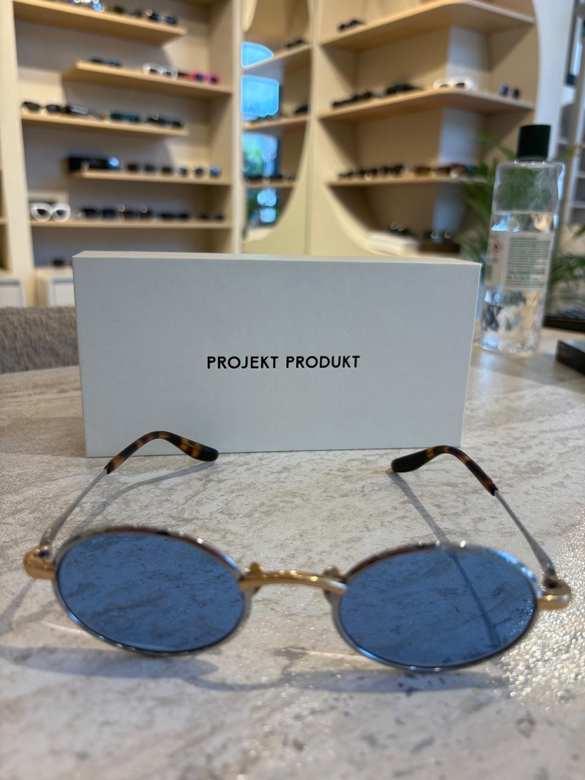 Projekt Produkt P11 CWG – Altın Detaylı Mavi Cam Yuvarlak Güneş Gözlüğü (50 mm)